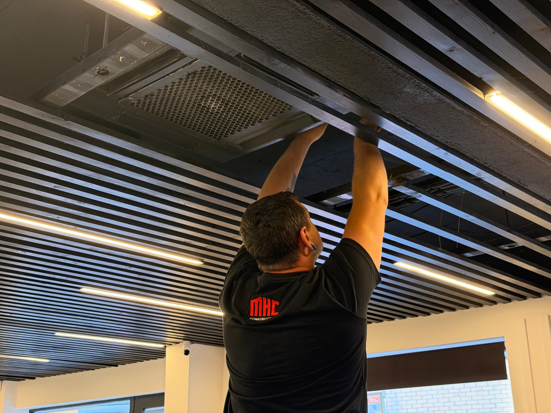 Removing AC grille for full strip-down service